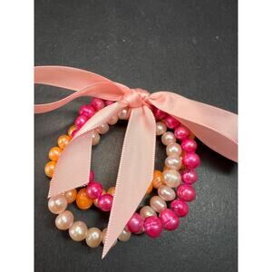 Set of three freshwater pearl stretch bracelets fuchsia pink to tangerine